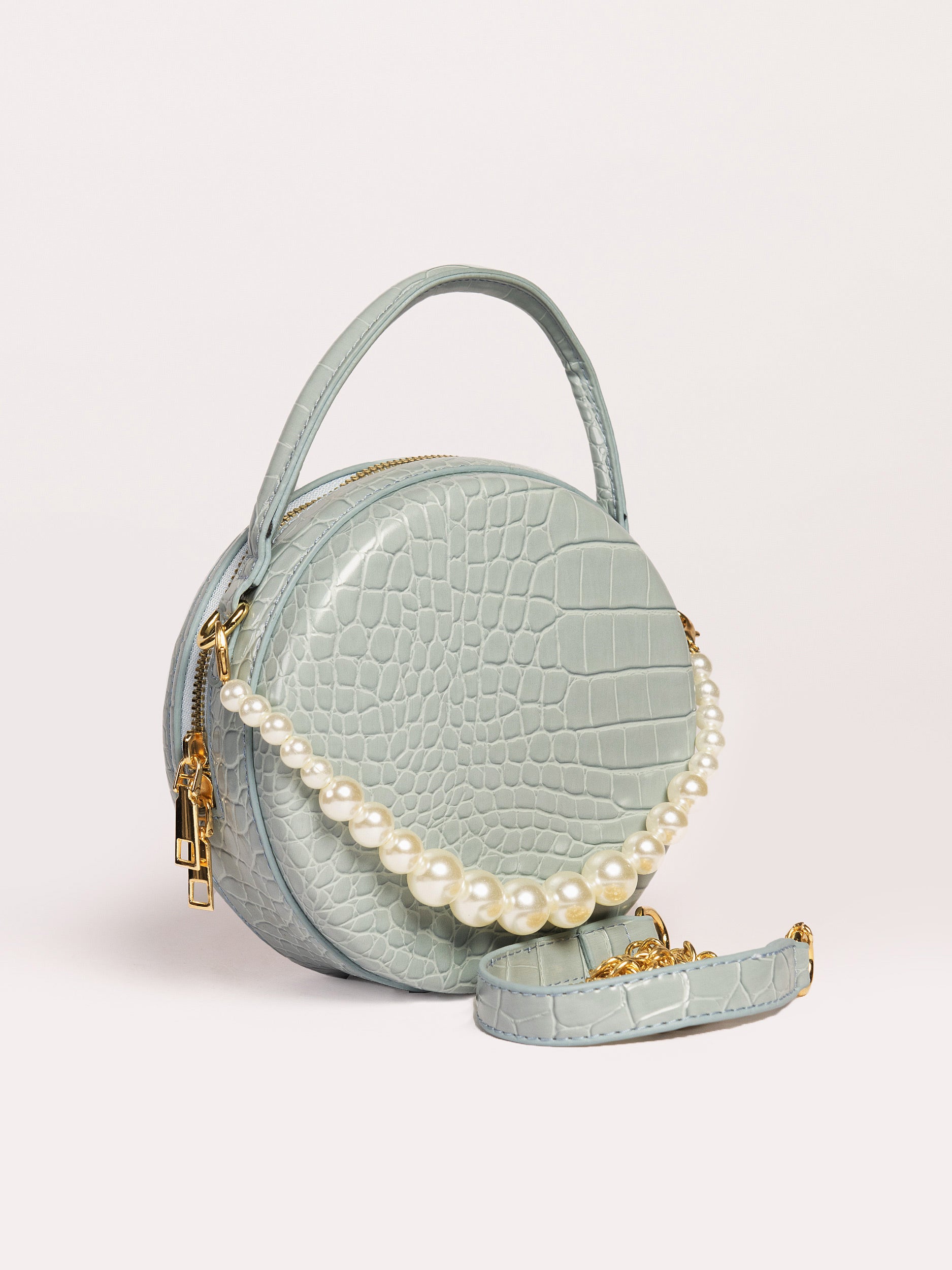 textured-pearl-circular-handbag