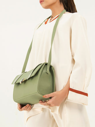 embossed-brooch-handbag